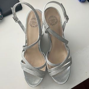 Pair of silver sandals.